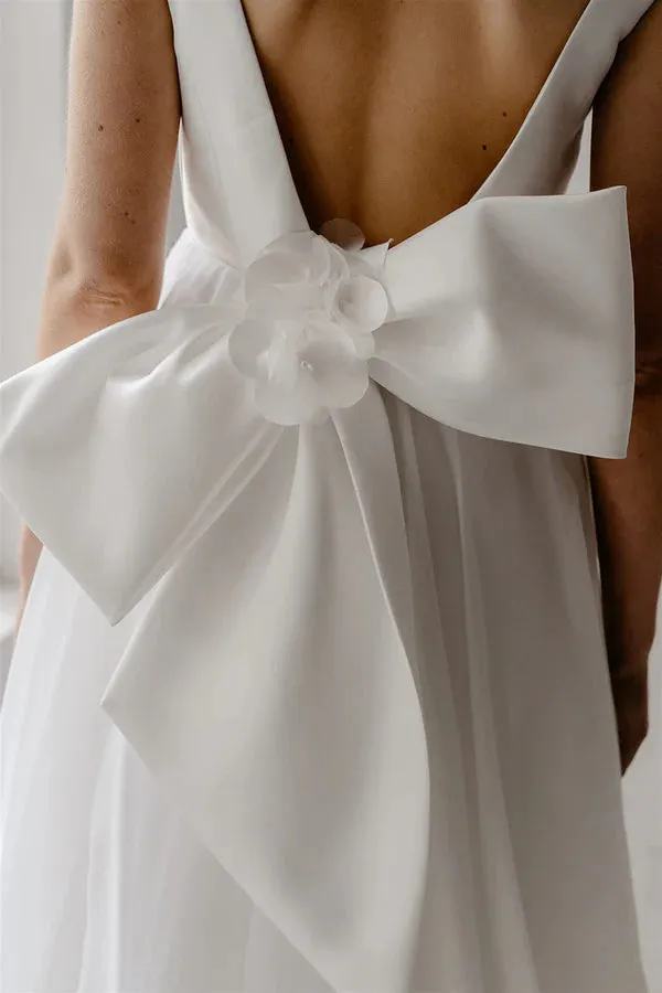 A-shaped deep V-neck ivory minimalist Bohemian style wedding dress with backless bride dress