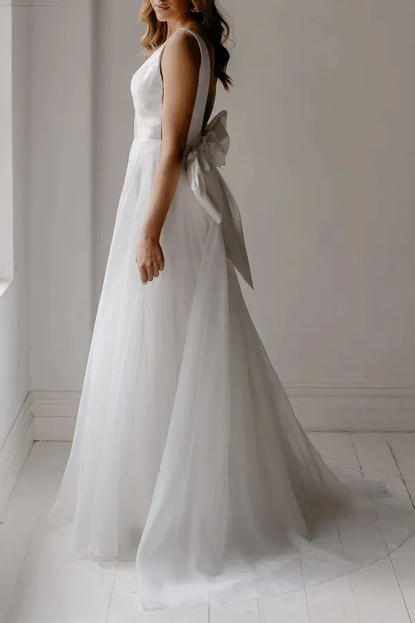 A-shaped deep V-neck ivory minimalist Bohemian style wedding dress with backless bride dress