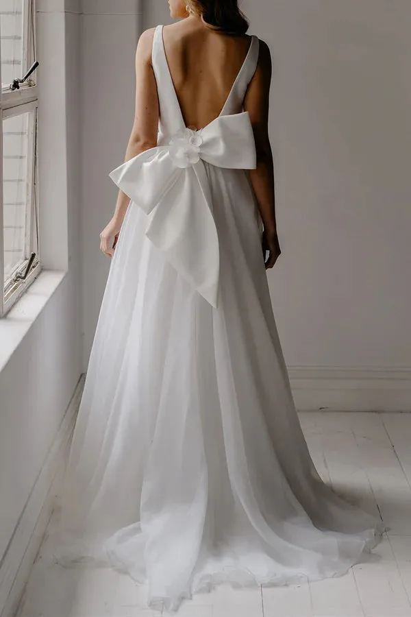 A-shaped deep V-neck ivory minimalist Bohemian style wedding dress with backless bride dress