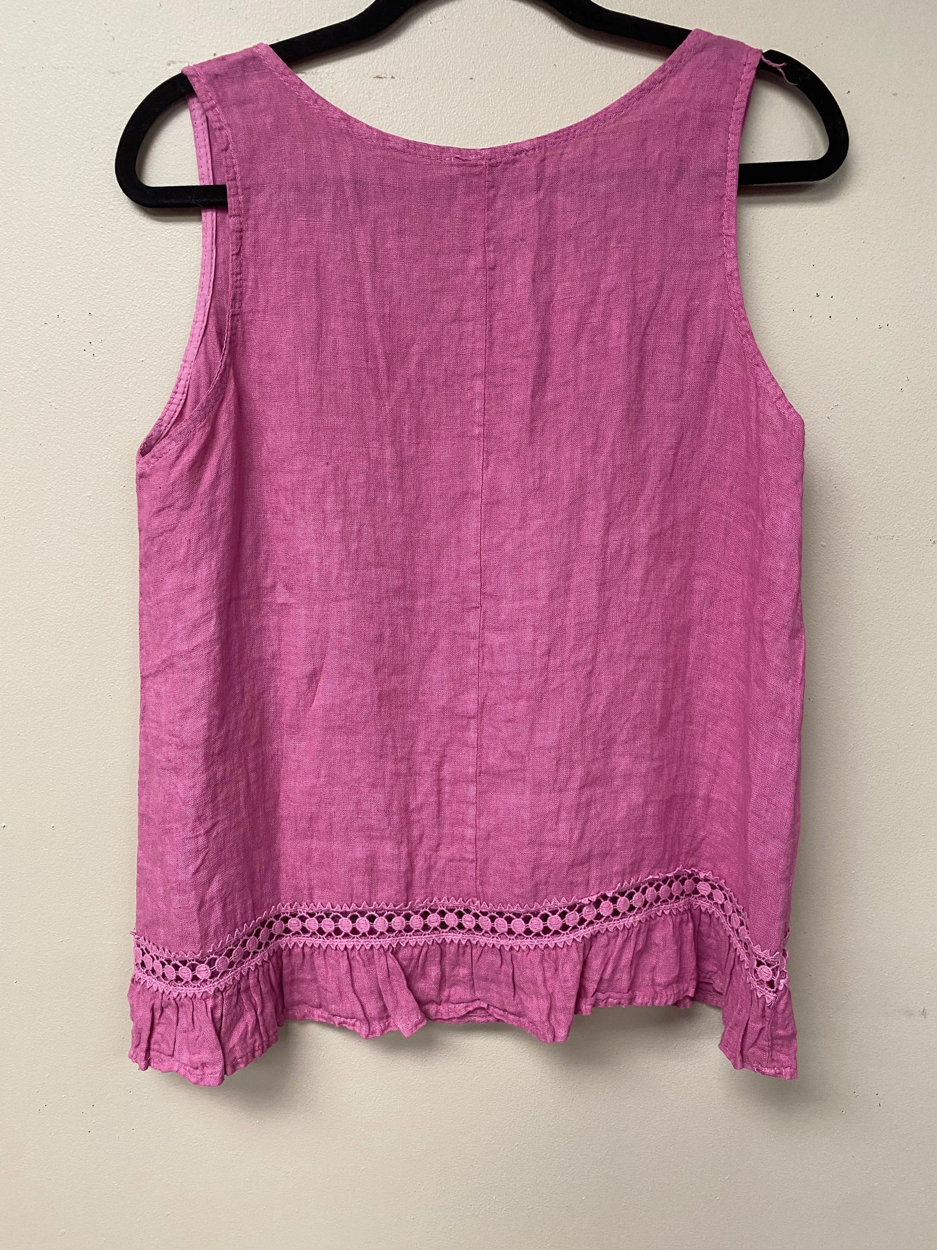 Italian linen with crocheted ribbon and ruffled hem.