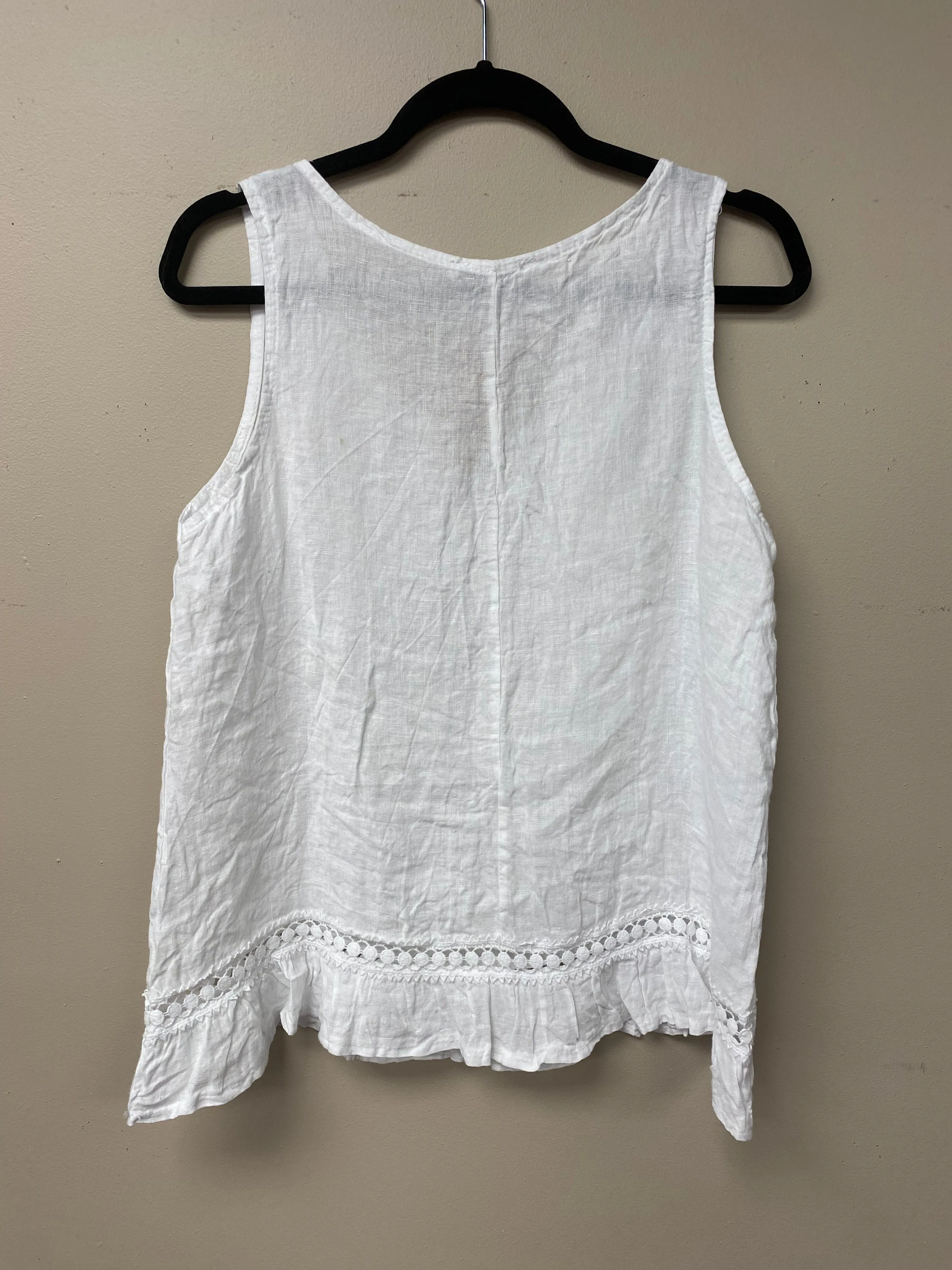 Italian linen with crocheted ribbon and ruffled hem.