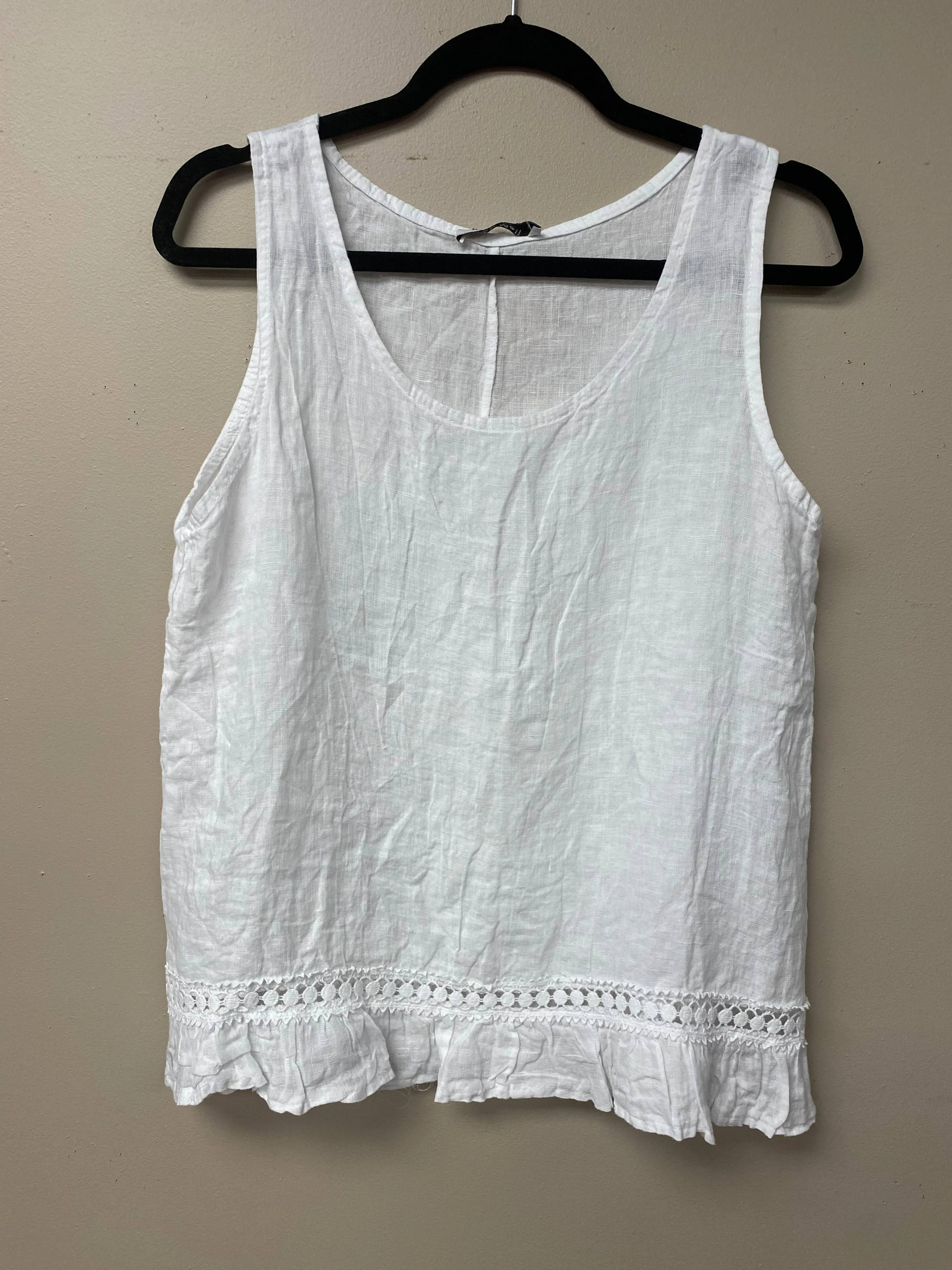 Italian linen with crocheted ribbon and ruffled hem.