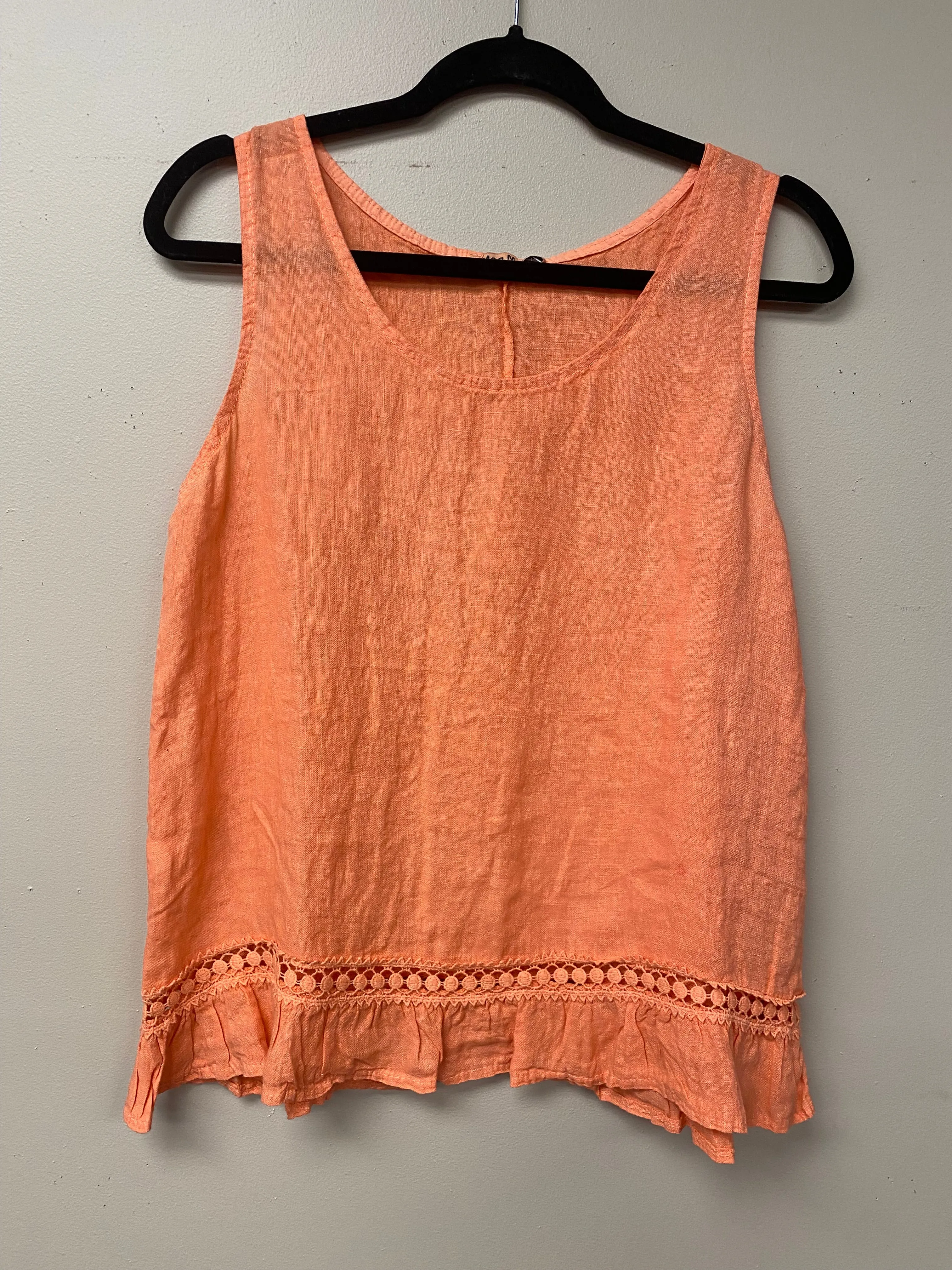 Italian linen with crocheted ribbon and ruffled hem.